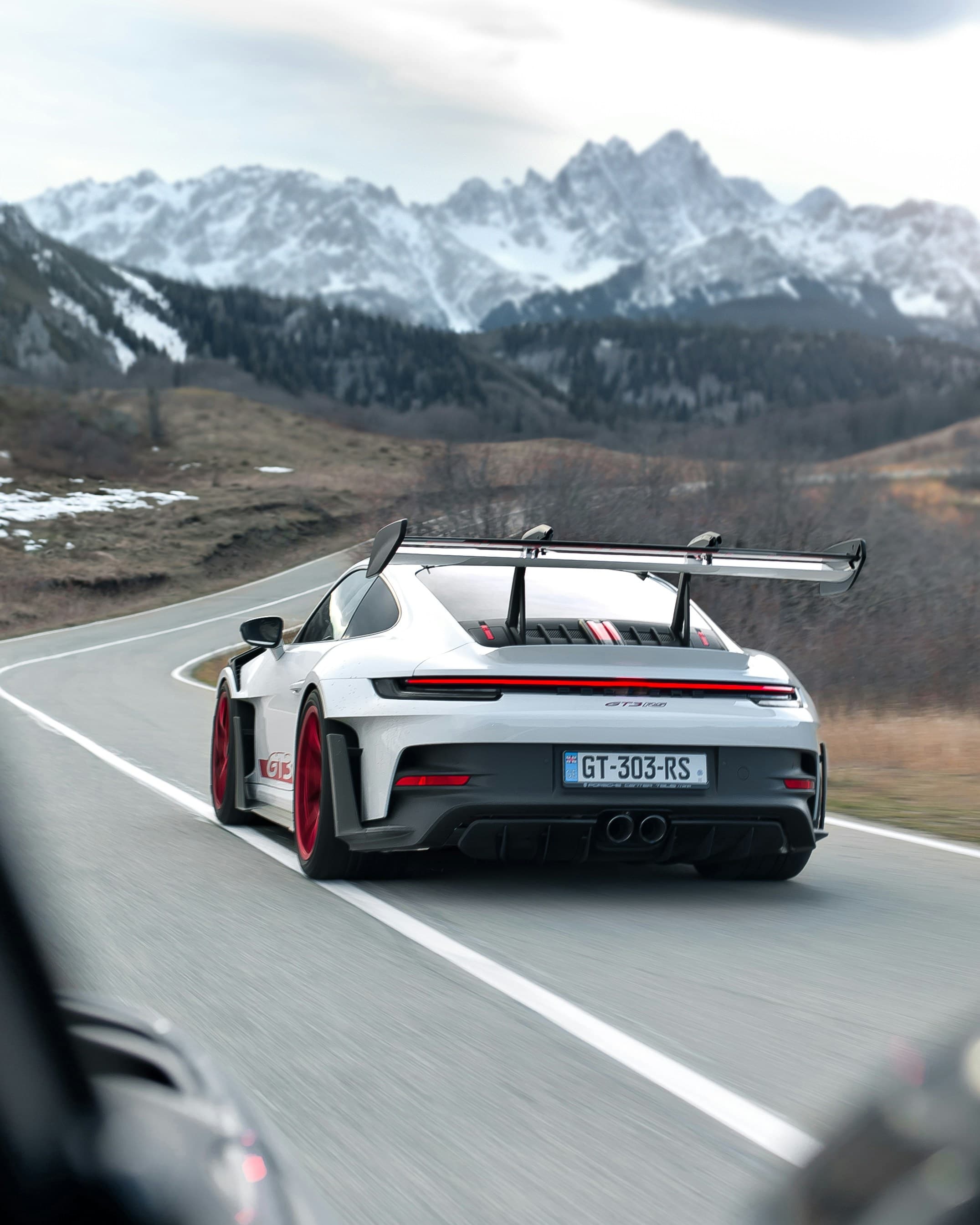 Porsche GT3RS along the twisty roads of the Swiss Alps